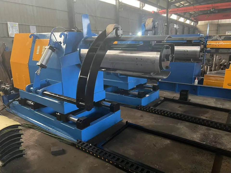 Blue coil-handling units with curved hold-down arms